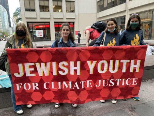 Kids holding Jewish Youth banner